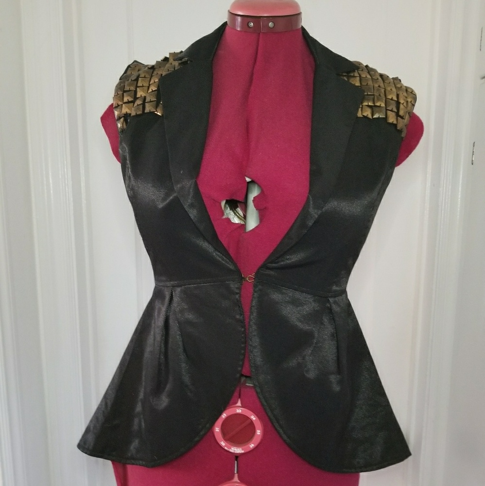 A-symmetric studded peplum vest